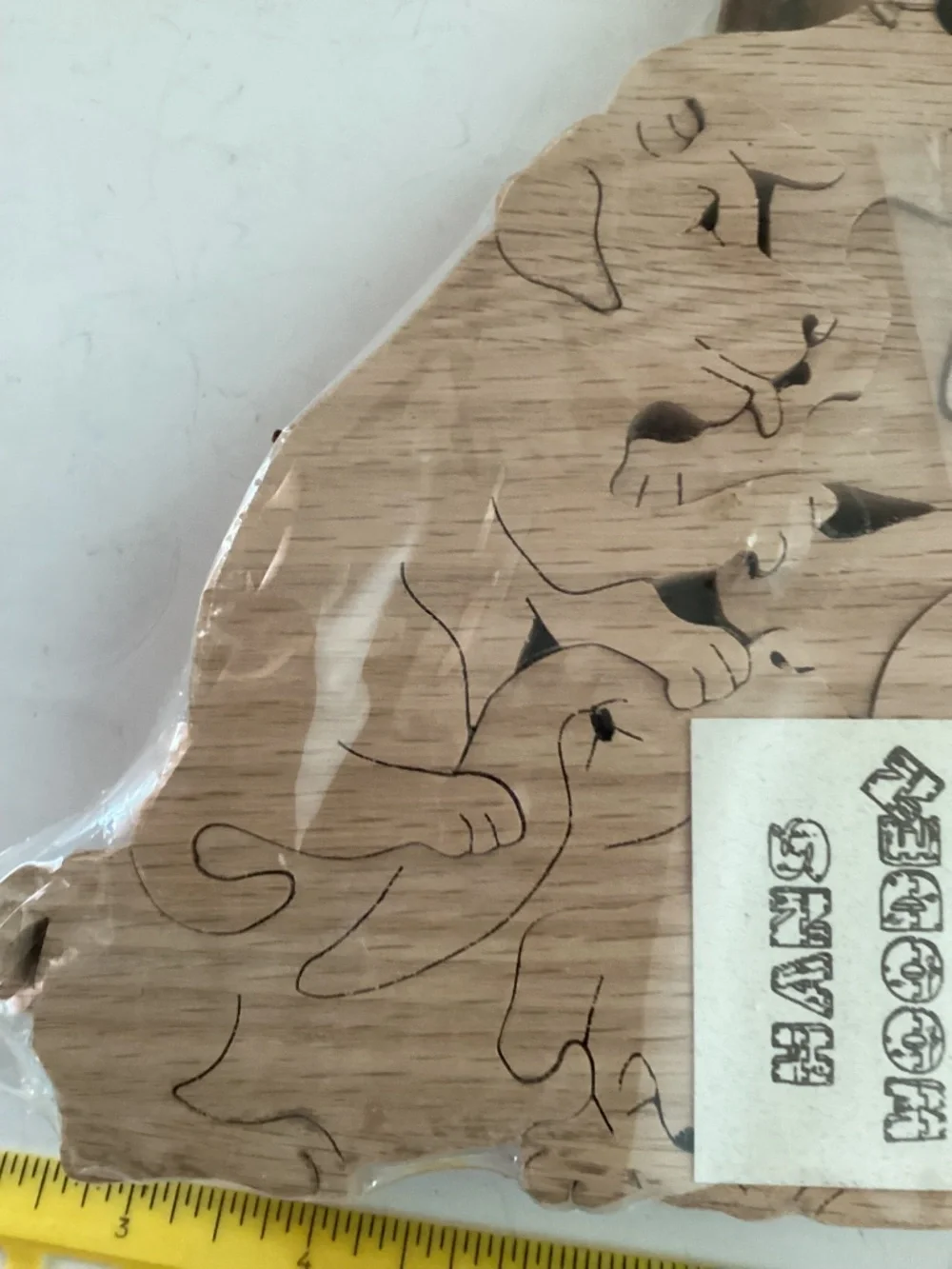 Hans Wooden Dog Shapes puzzle  9 pieces of dogs, bones and a ball